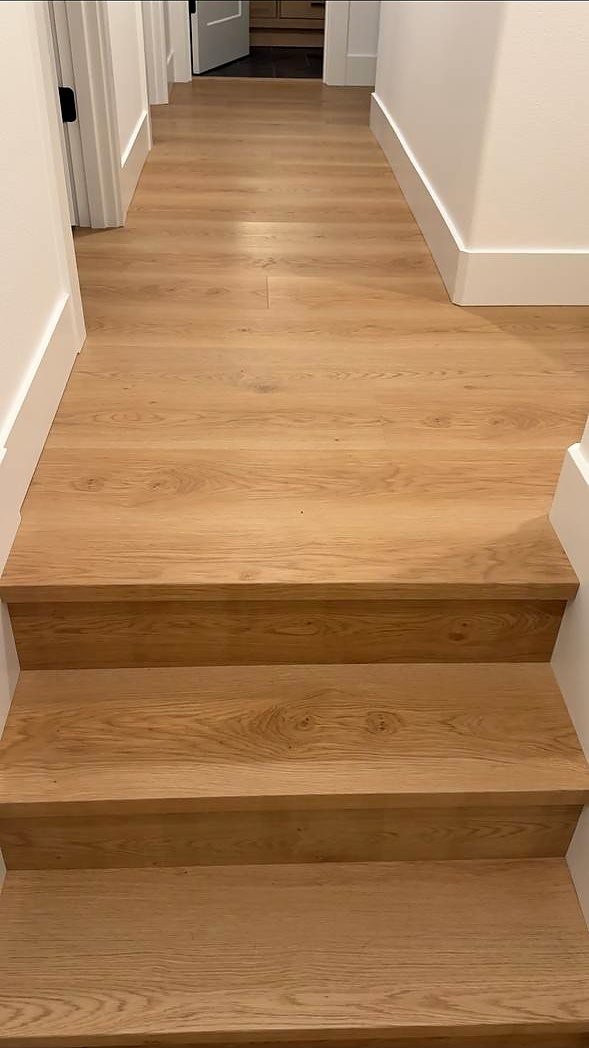 White oak flooring running into stair treads